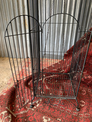 A large black Gothic bird cage