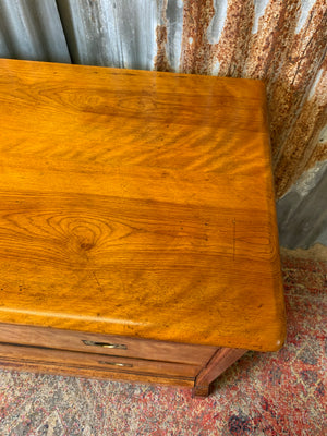 A satinwood chest of drawers