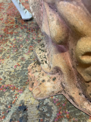 A large terracotta buddha statue