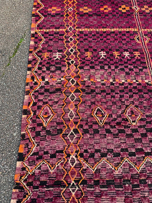 A very large purple ground Berber rug ~ 415cm or 14ft