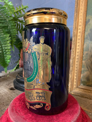 A blue glass myrrh apothecary jar by the Royal Pharmaceutical Society