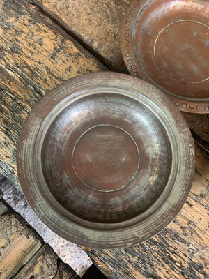 A set of six tinned copper bowls