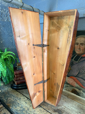 A Victorian coffin box with half-sized anatomical skeleton model