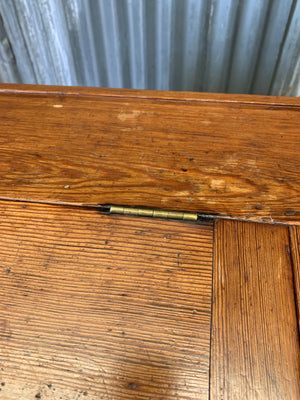 A pine double lectern standing desk