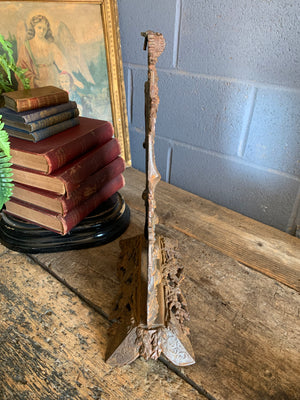 A cast iron table top mirror