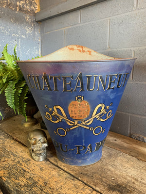 A large metal grape hod