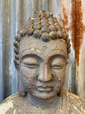 A large seated Buddha