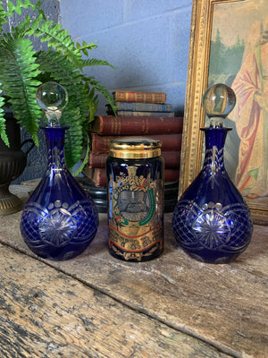 A blue glass myrrh apothecary jar by the Royal Pharmaceutical Society