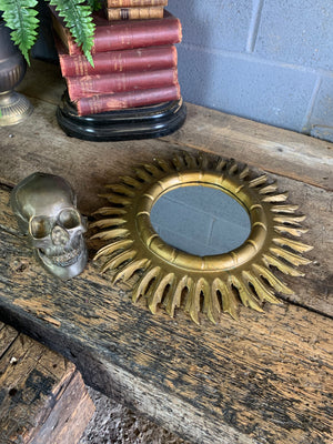 A Spanish giltwood sunburst mirror