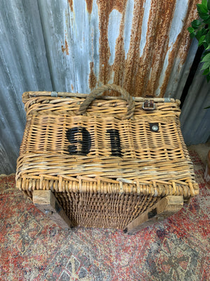 A Victorian wicker laundry basket on castors ~ B