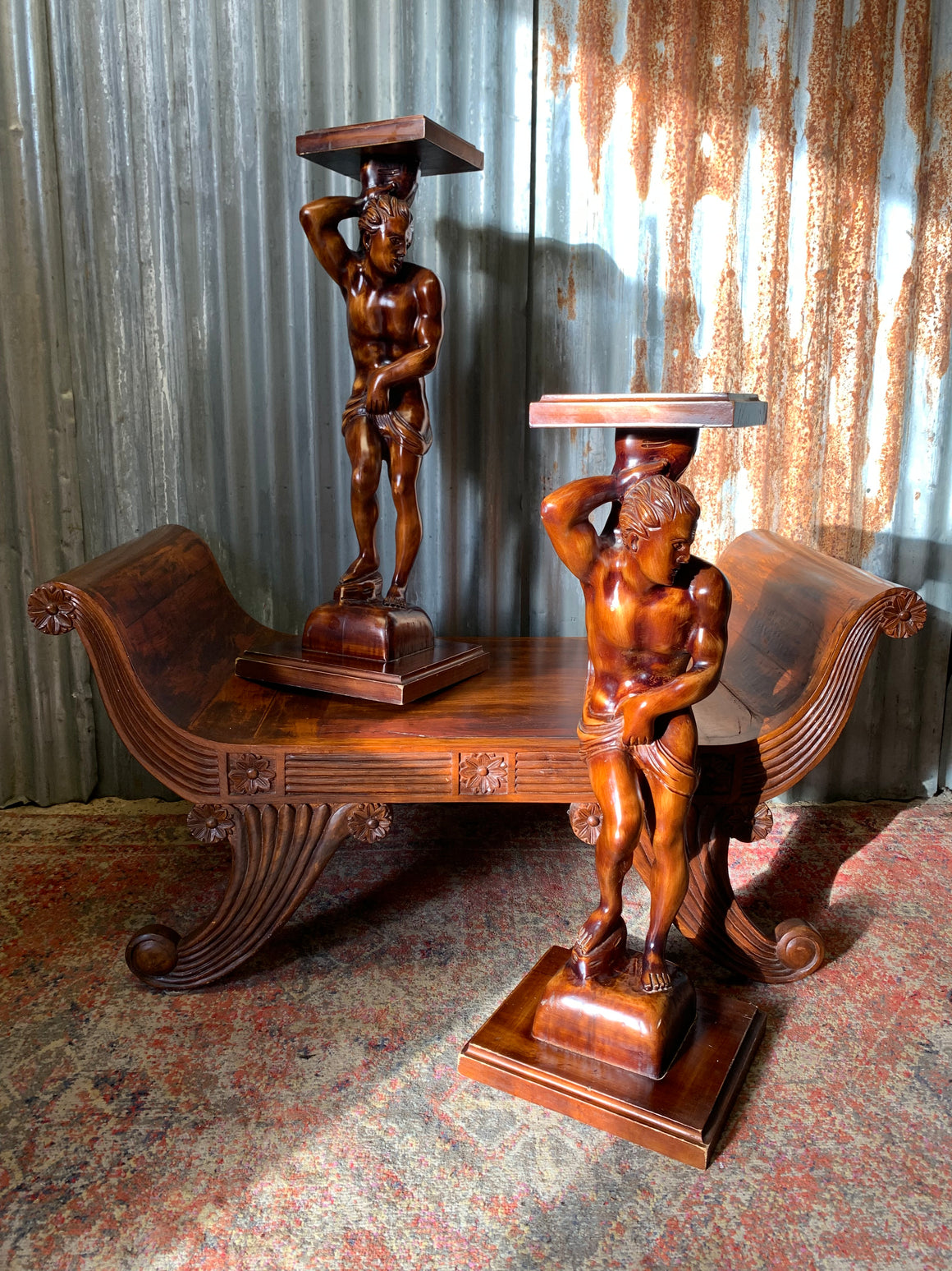 A pair wooden torcheres in the form of Hercules