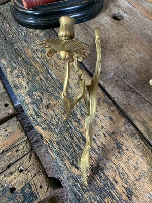 A pair of heavy brass Rococo style candle scones