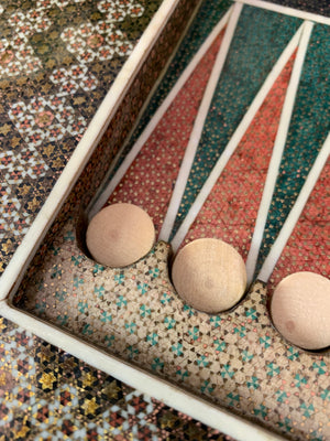 A Persian khatam tazhib circular games board and pieces