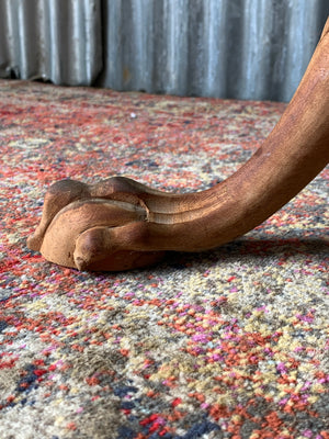 A Georgian style tilt top table with ball and claw feet