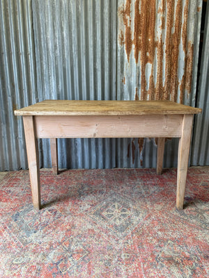 A pine kitchen table by Staines of Westminster