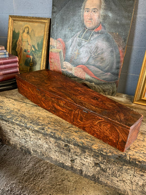 A Victorian coffin box with half-sized anatomical skeleton model