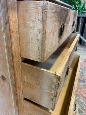 A pine chest of two over two drawers