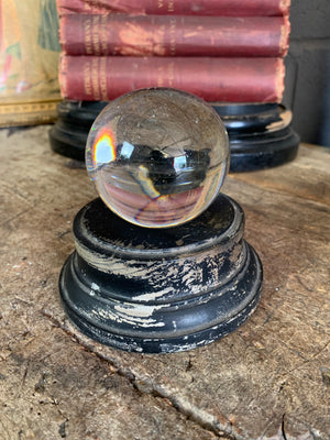 A Victorian crystal ball with box and stand