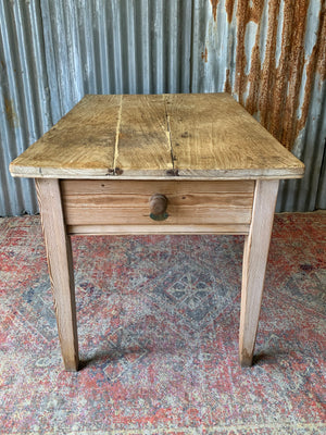 A pine kitchen table by Staines of Westminster