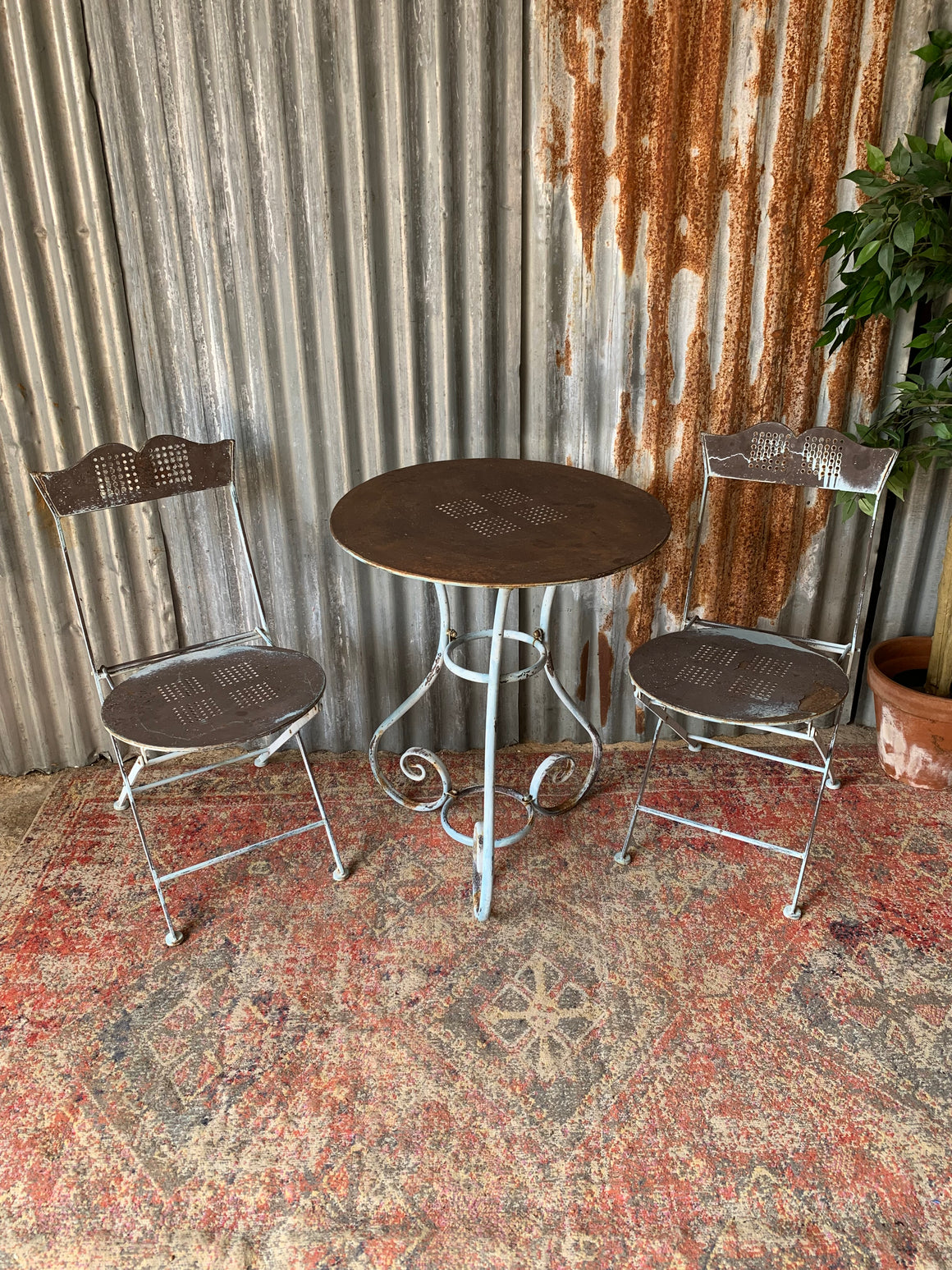 A pale blue French bistro set - table and two chairs BROKE