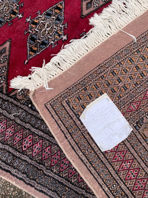 A long pink ground Persian runner rug ~ 318cm x 83cm