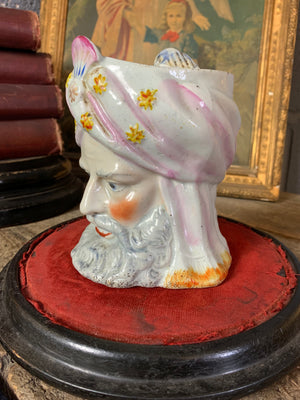 A ceramic tobacco jar in the form a Turk's head