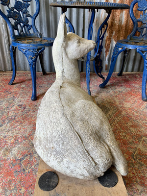 A large deer or fawn garden statue