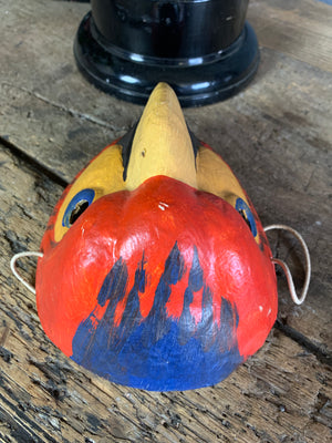 A Ukrainian papier-mâché mask of a macaw