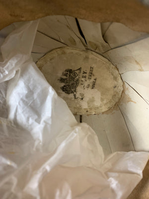 A Royal Navy bicorn hat in monogrammed tin