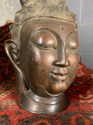A life size bronze Guanyin bust