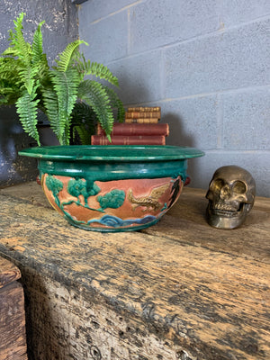 A large Chinese green glaze clay jardiniere