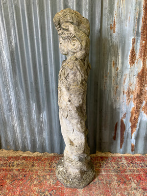 A cast stone garden statue of Guanyin