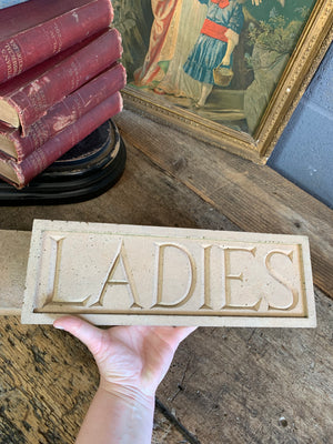 A pair of cast stone plaques ~ "LADIES" & "GENTS"