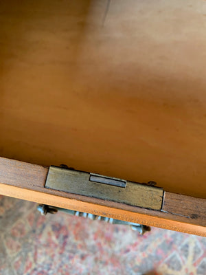 An Art Nouveau chest of drawers