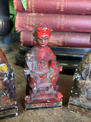 A group of four Chinese carved wood and gesso figures