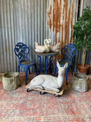 A large deer or fawn garden statue