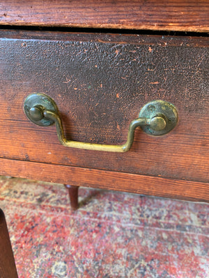 An oak two drawer table