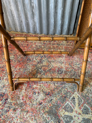 A faux bamboo butler's tray table