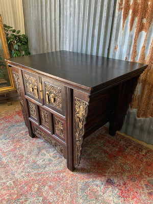 A carved wooden Chinese altar cabinet