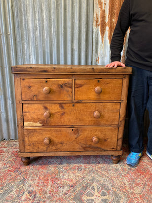 A pine chest of two over two drawers