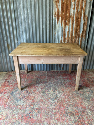 A pine kitchen table by Staines of Westminster
