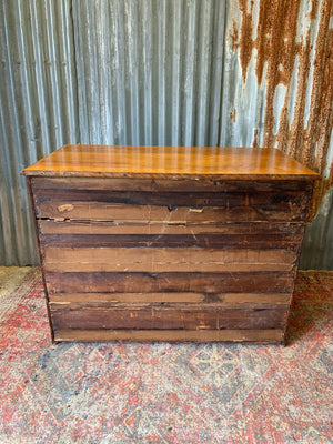 A satinwood chest of drawers