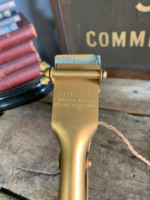 An Art Deco brass clip-on swan neck lamp