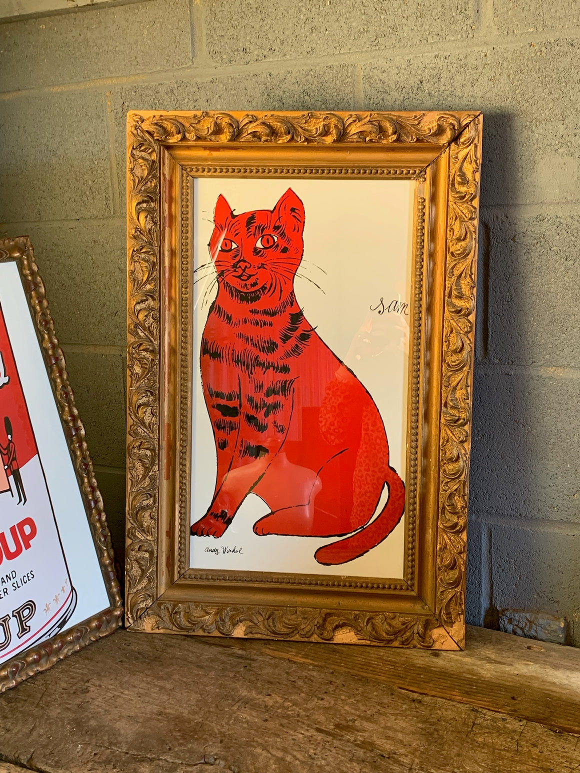 A framed and glazed Warhol print - "Sam" - in an antique frame