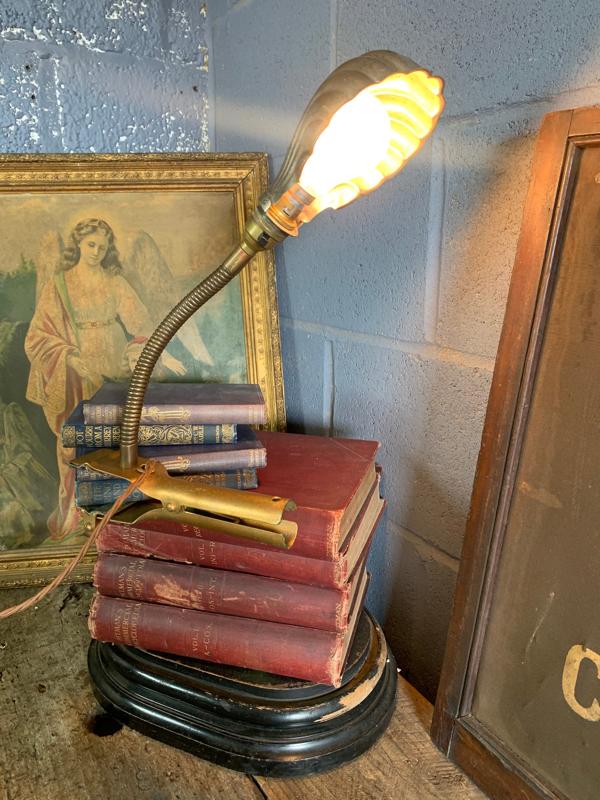 An Art Deco brass clip-on swan neck lamp - Main Image