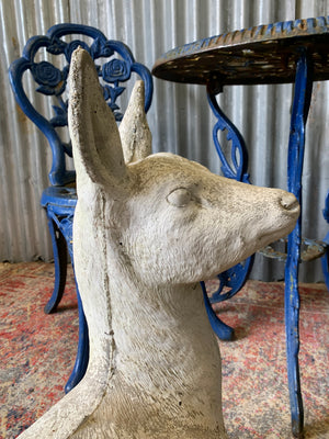 A large deer or fawn garden statue