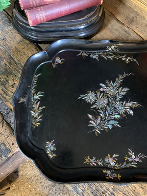 A large mother of pearl inlaid lacquered tray