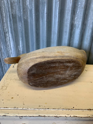 A wooden duck decoy