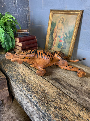 A large brown leather tiger