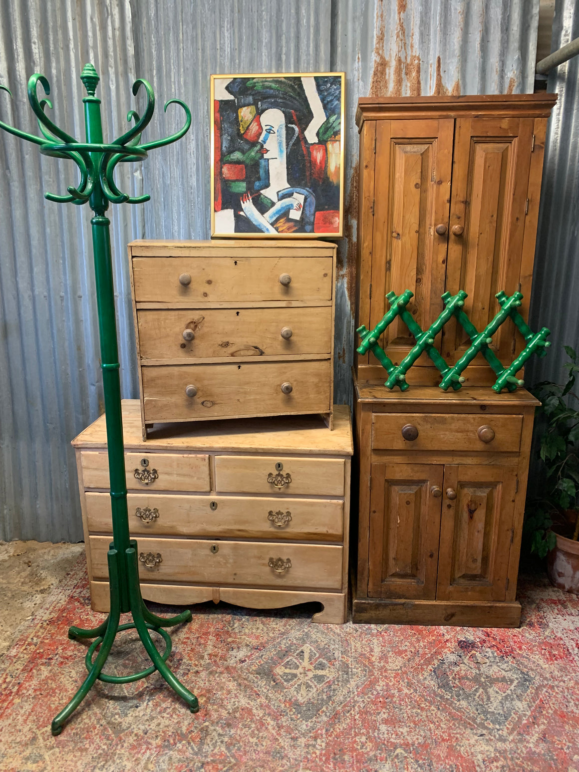 A tall bentwood coat stand with hat rack